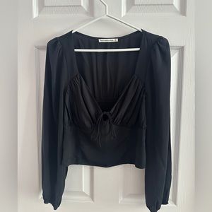 Abercrombie and Fitch.  Long sleeve black top. Never worn.